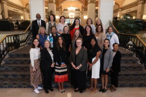 Group of people standing on staircase